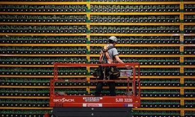 An illustration of a mining farm with rows of mining rigs operating.