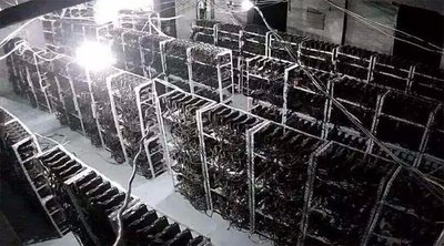 A bustling mining farm hosting various machines, illustrating the scale of professional cryptocurrency operations